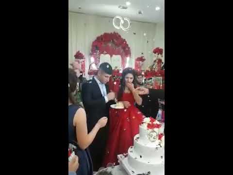 Angry groom loses it during wedding cake cutting ceremony, leaving guests and bride horrified